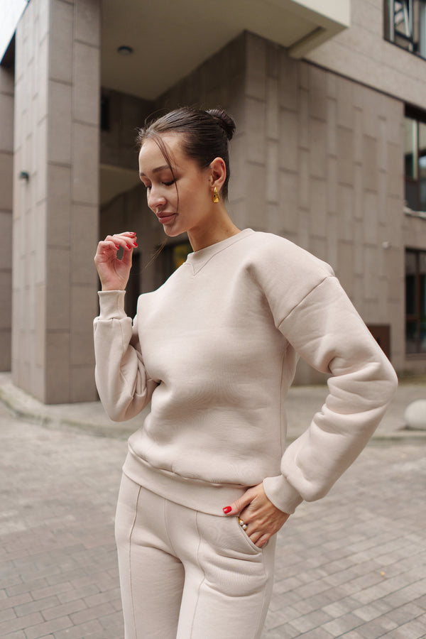 Бежевий костюм з Світшотом і брюками палаццо