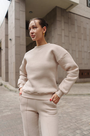 Бежевий костюм з Світшотом і брюками палаццо