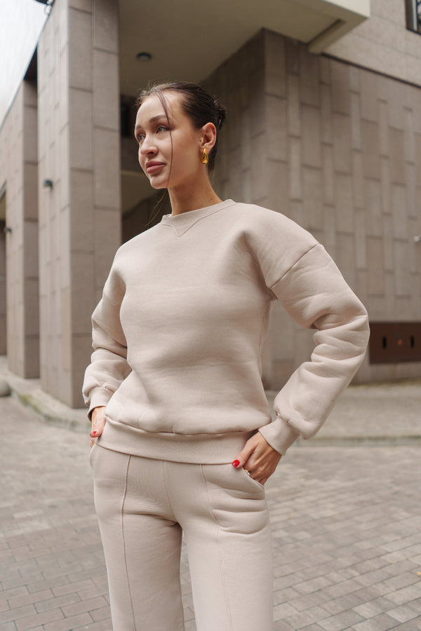 Бежевий костюм з Світшотом і брюками палаццо