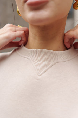 Бежевий костюм з Світшотом і брюками палаццо